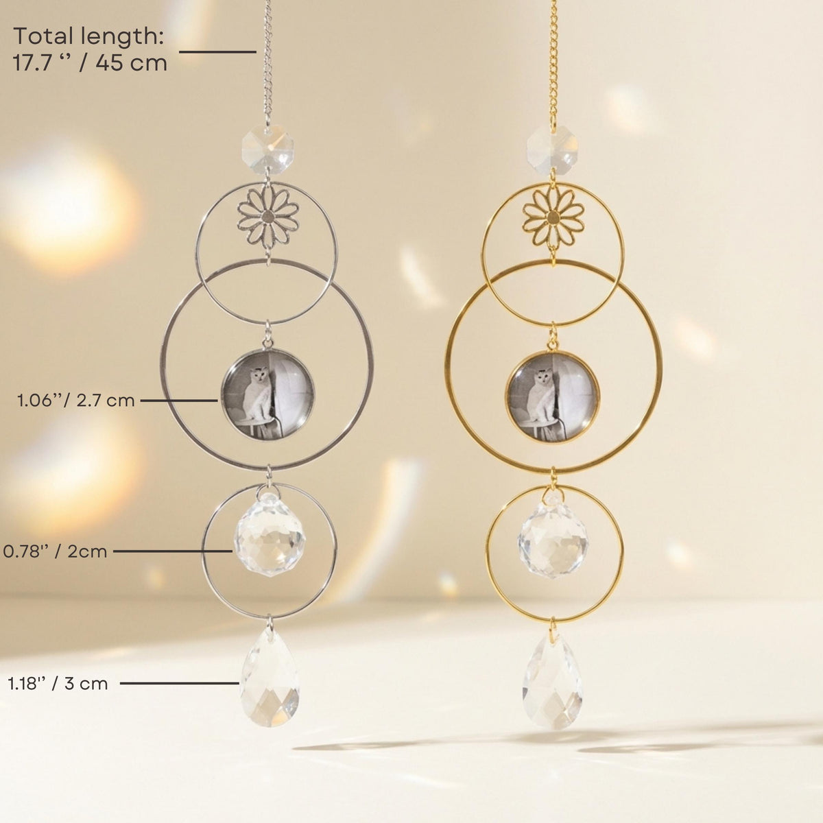 Two circular hanging decorations with crystal elements on a neutral background