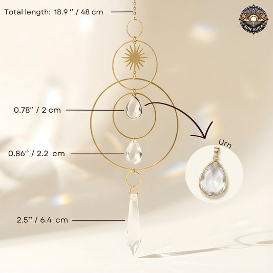 Gold and crystal sun catcher with measurements on a neutral background