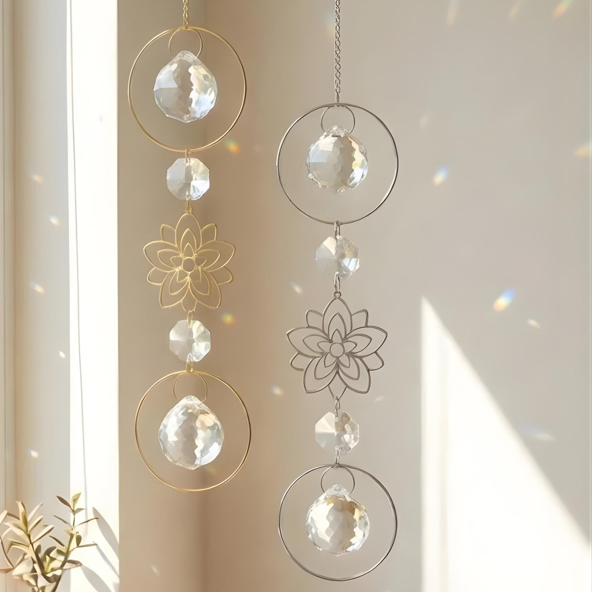 Decorative hanging crystal mobile with floral designs on a neutral background