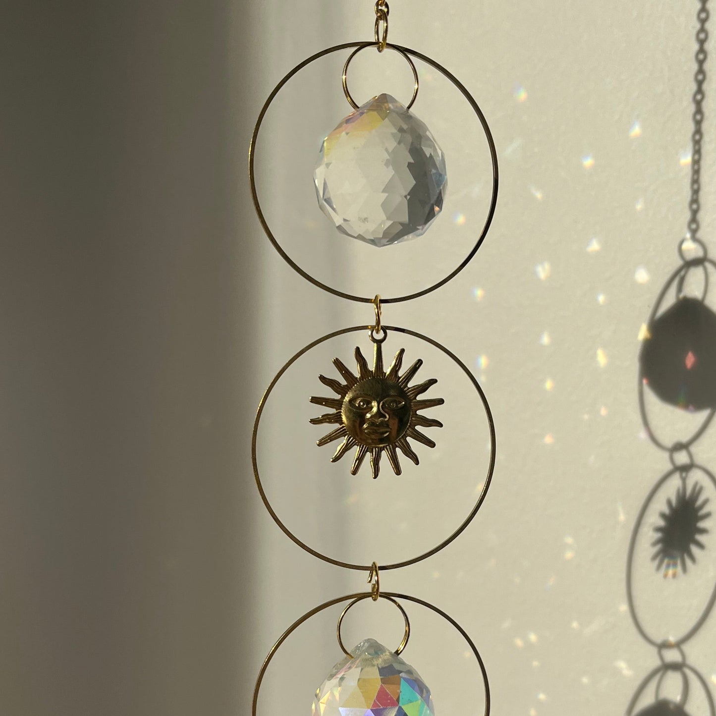 Necklace with circular pendants on a light background