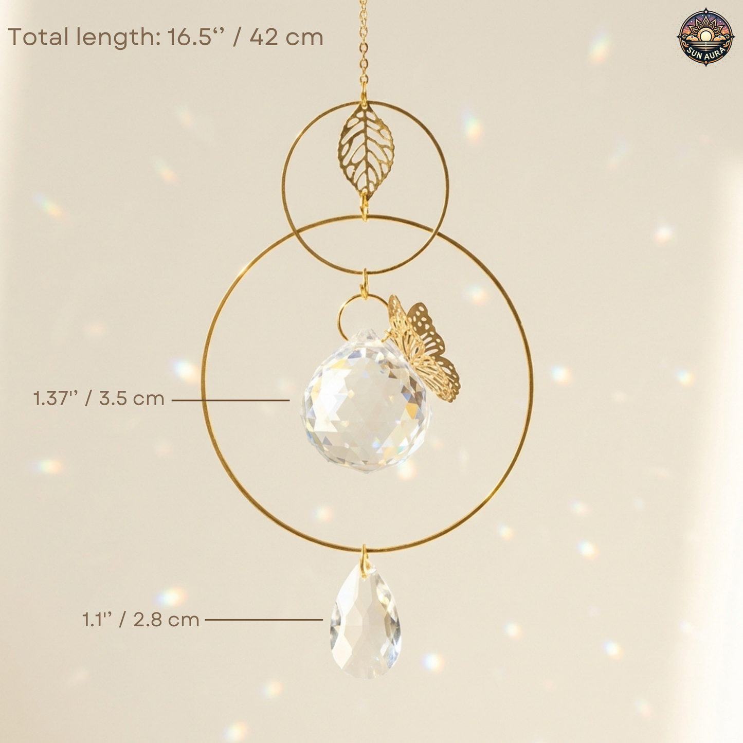 Decorative hanging ornament with crystal ball and gold accents on a beige background
