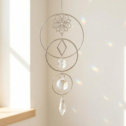Decorative hanging crystal with geometric design in a bright room