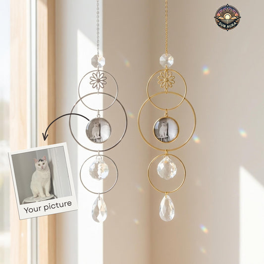 Decorative hanging with crystal elements and a photo of a cat on a neutral background