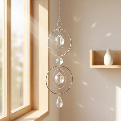 Decorative hanging crystal ornament in a room with a window