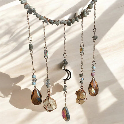 Necklace with various beads and stones on a light background