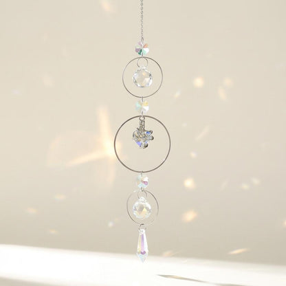Crystal hanging ornament with multiple levels on a neutral background
