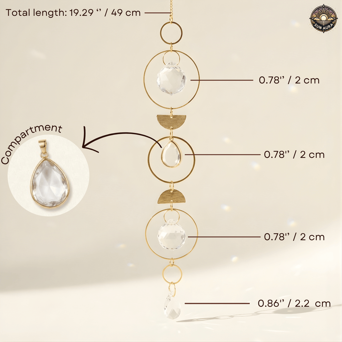 Gold-toned suncatcher with clear faceted glass and teardrop glass elements, shown with measurement callouts and a inset showing the pendant compartment.