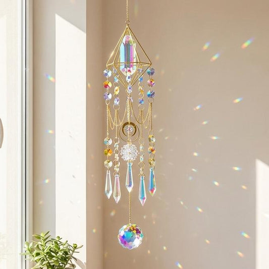 Decorative crystal chandelier hanging in a room with sunlight streaming through a window.