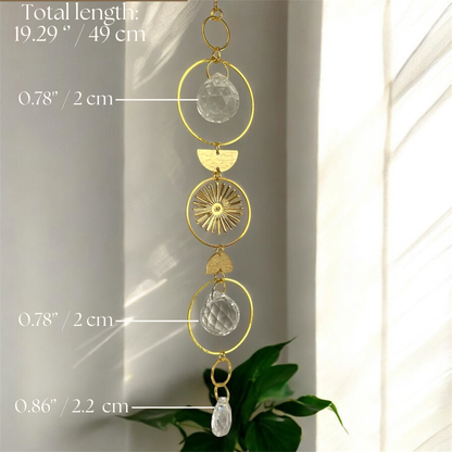 Decorative hanging with measurements against a neutral background