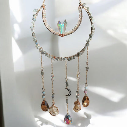 Suncatcher with crystal pendants on a white background