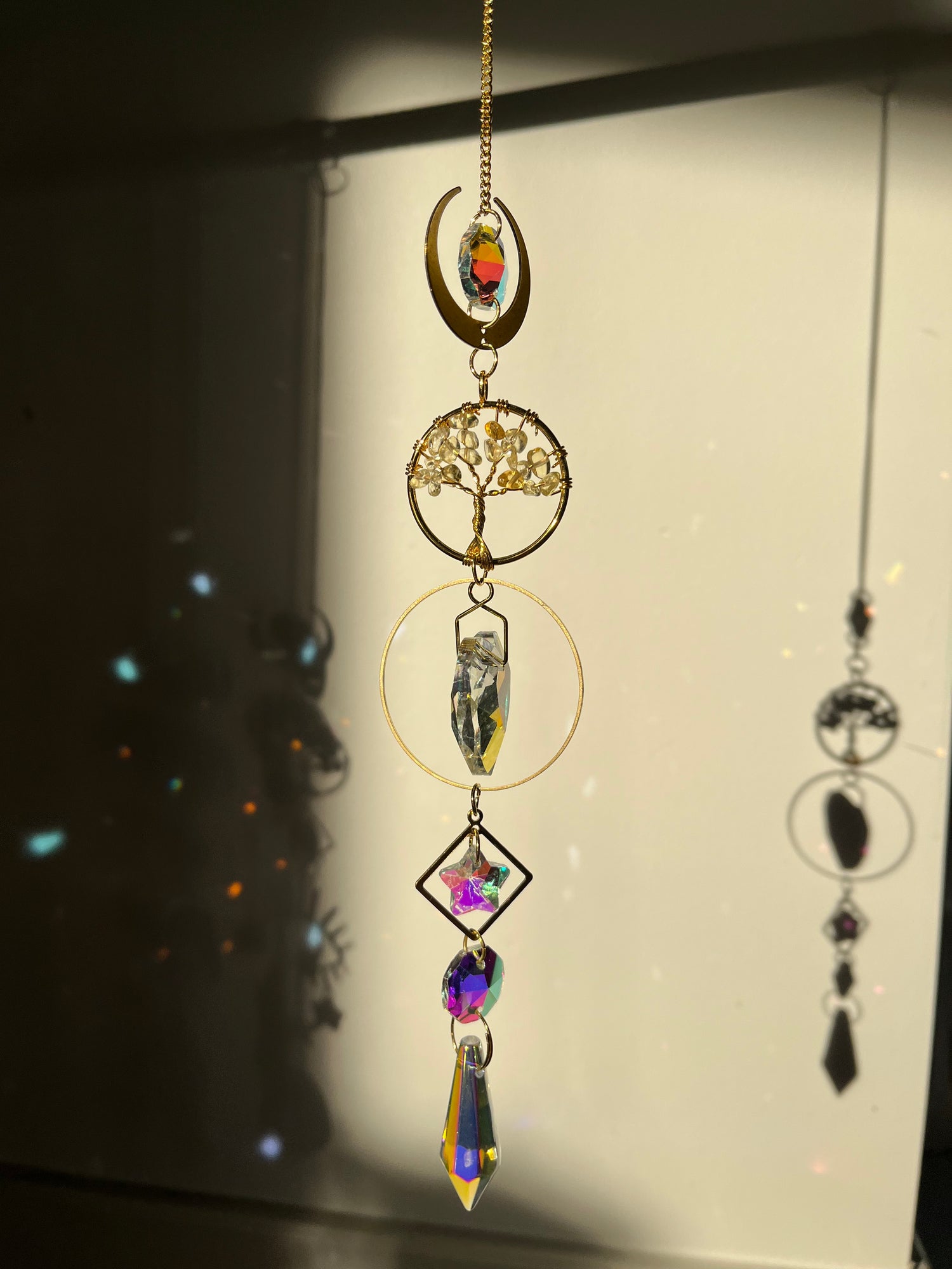 Decorative wall art with colorful elements on a plain background