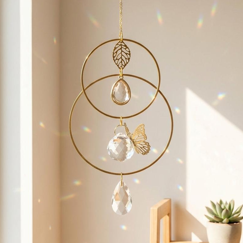 Decorative hanging pendant with gold chain, circular design, and crystal elements in a room setting.
