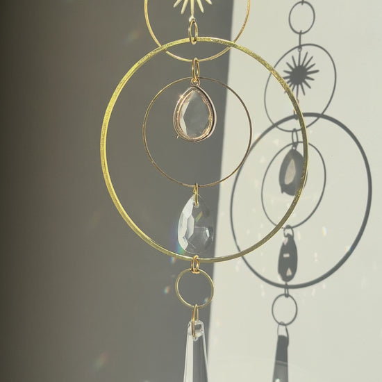 Hanging Window decor of a crystal suncatcher urn 